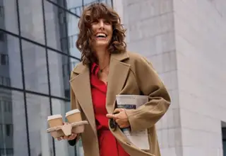 energetic smiling woman on her way to work