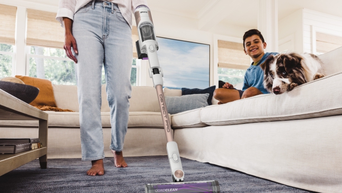 Shark Detect Pro with self-emptying base in a home living room